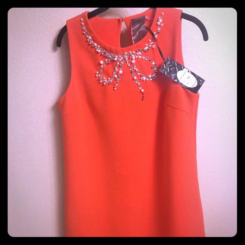 Tangerine embellished bow dress
